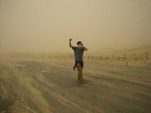 Hitchhiking during sand storm in Takla Makan